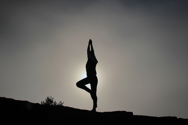 Person doing yoga.